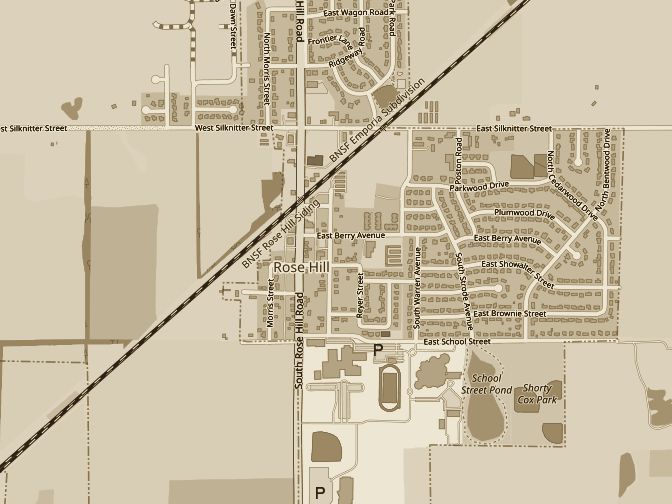 Street map of Rose Hill, Kansas, in sepia, with a pin on North Rose Hill Road just south of Silknitter Street