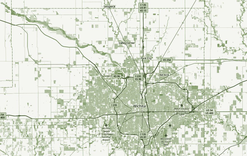 Road map of Wichita and its northwest suburbs in pale green, with routes drawn from Maize out to Goddard, Park City, Andover and west Wichita